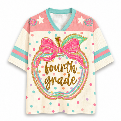 Front view of the ChaoticClub Preppy Back to School Teacher Apple Mesh Jersey, featuring a cute apple graphic with a pink bow, colorful polka dots, and gold glitter "fourth grade" text.