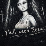 Black mesh athletic shirt featuring a black and white graphic of a woman with long hair, a cross necklace, and the text 'Y'all need Jesus.' with hand-drawn style crosses and stars.