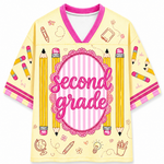 Yellow jersey with 'second grade' text and pencil design on a white background