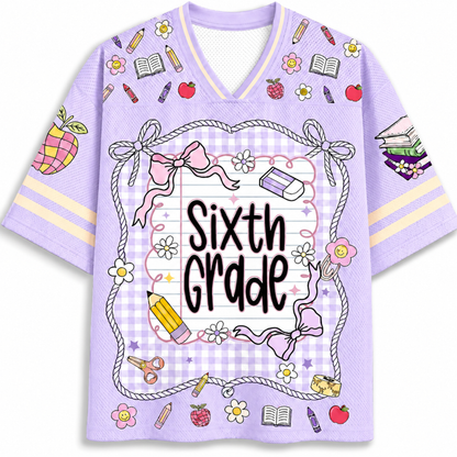 Purple shirt with 'Sixth Grade' text and educational-themed graphics on a white background