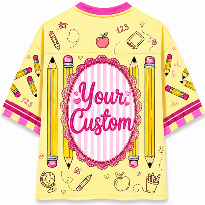 Yellow shirt with educational-themed graphics and 'Your Custom' text