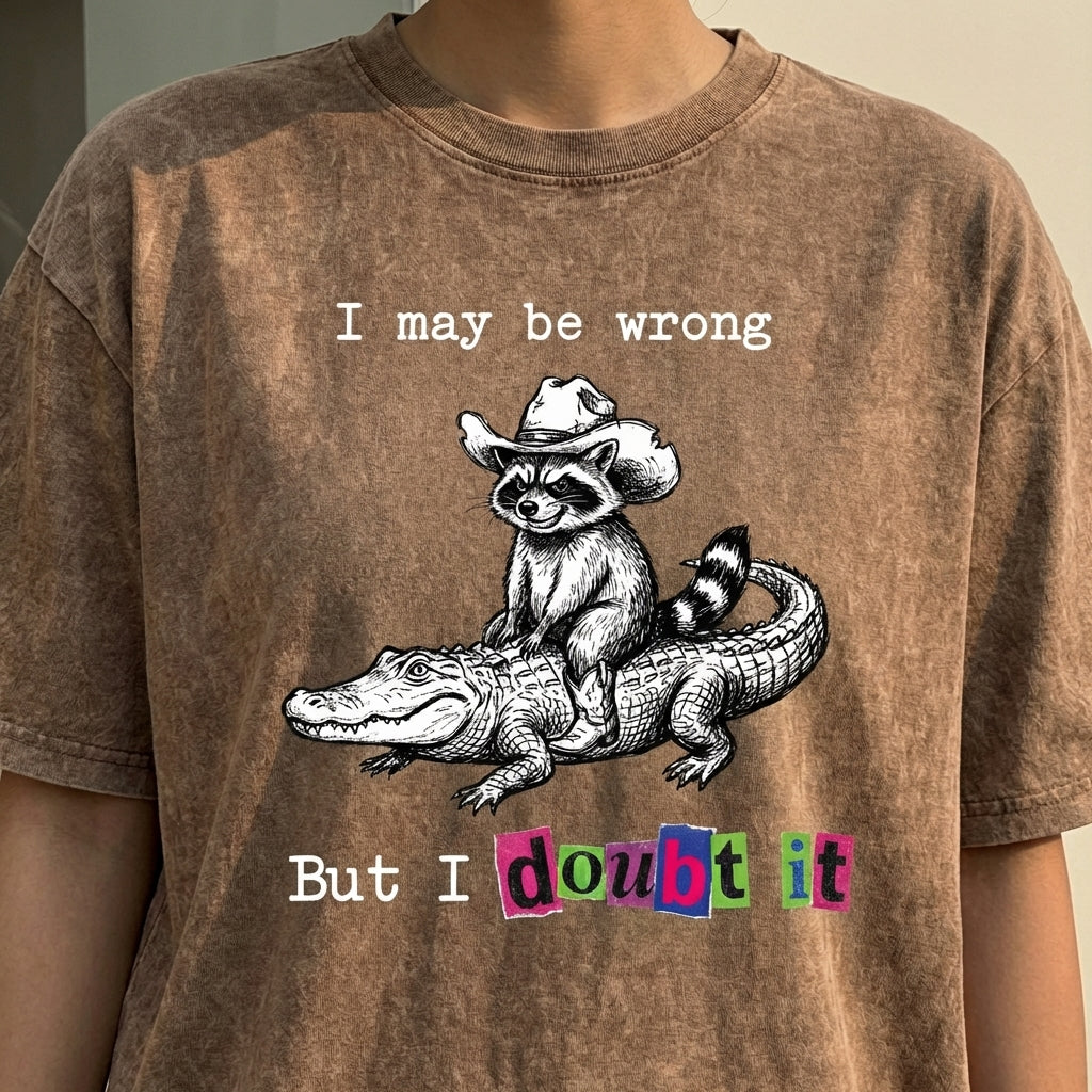 ChaoticClub I May Be Wrong But I Doubt It Raccoon Washed T-Shirt, vintage oversized graphic tee with a funny sarcastic raccoon design on premium washed cotton fabric