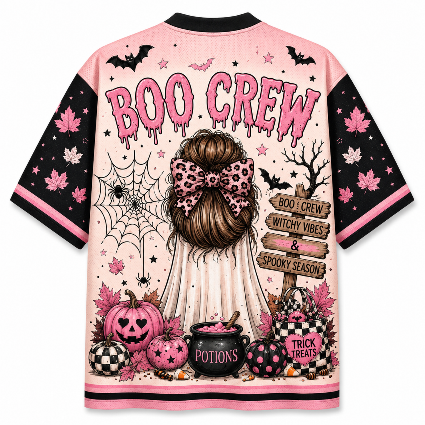A short-sleeve t-shirt with a pink and black Halloween-themed graphic print. The back of the shirt features the text 'BOO CREW' in dripping pink letters above an illustration of a girl with a leopard-print bow, surrounded by pumpkins, a cauldron, bats, and a spiderweb.