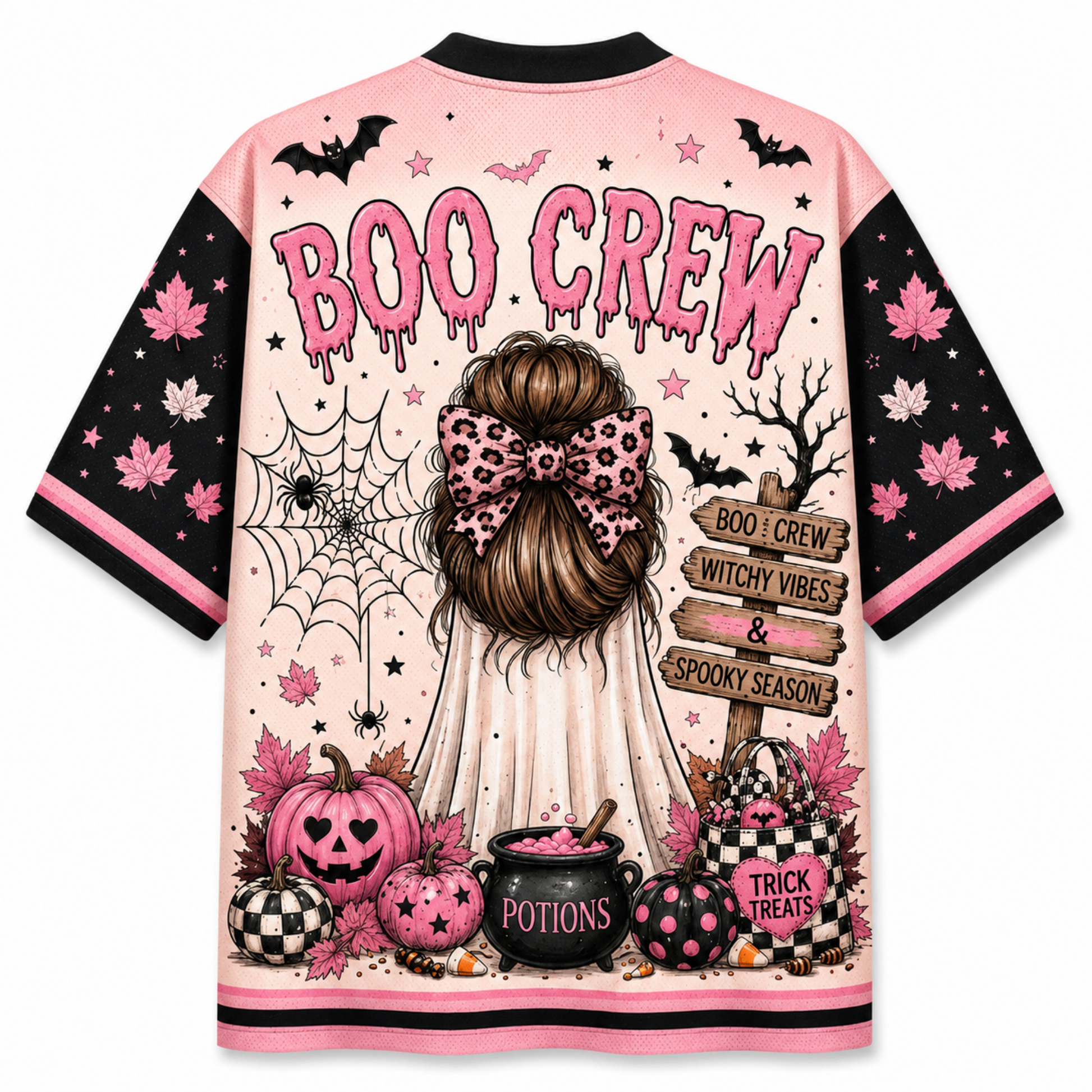 A short-sleeve t-shirt with a pink and black Halloween-themed graphic print. The back of the shirt features the text 'BOO CREW' in dripping pink letters above an illustration of a girl with a leopard-print bow, surrounded by pumpkins, a cauldron, bats, and a spiderweb.