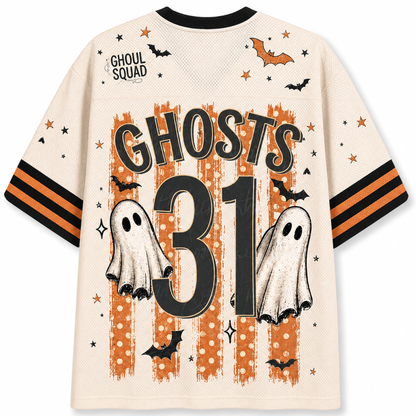 A cream-colored mesh short-sleeve t-shirt with a Halloween 'Ghoul Squad' theme, featuring 'GHOSTS 31' and ghost graphics on the back, with orange and black striped sleeves.