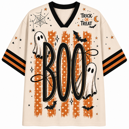 A Halloween-themed short-sleeve V-neck t-shirt with a cream base, featuring orange and black striped sleeves, a black V-neck collar, and a graphic print with the word 'BOO' in black over orange polka-dot stripes, white ghosts, black bats, spiderwebs, stars, and 'TRICK OR TREAT' text.