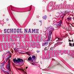 Pink and white mesh athletic jersey with a cartoon pink mustang horse graphic, purple sunglasses, gem details, and text reading 'SCHOOL NAME', 'MUSTANGS', and 'Cheerleader'.
