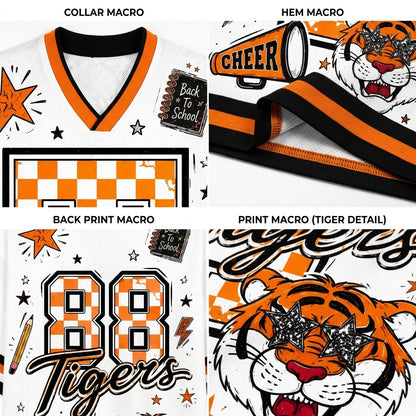 A four-panel product detail collage for a white V-neck athletic jersey with orange and black graphics. The panels show the collar macro, hem macro, back print macro, and tiger detail macro, featuring orange and black checkered patterns, the number 88, 'Tigers' script, stars, and a tiger face with star glasses.