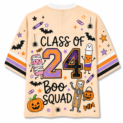 A light peach-colored short-sleeve t-shirt with a colorful 'Class of 2024 Boo Squad' Halloween graphic, shown on a plain white background.