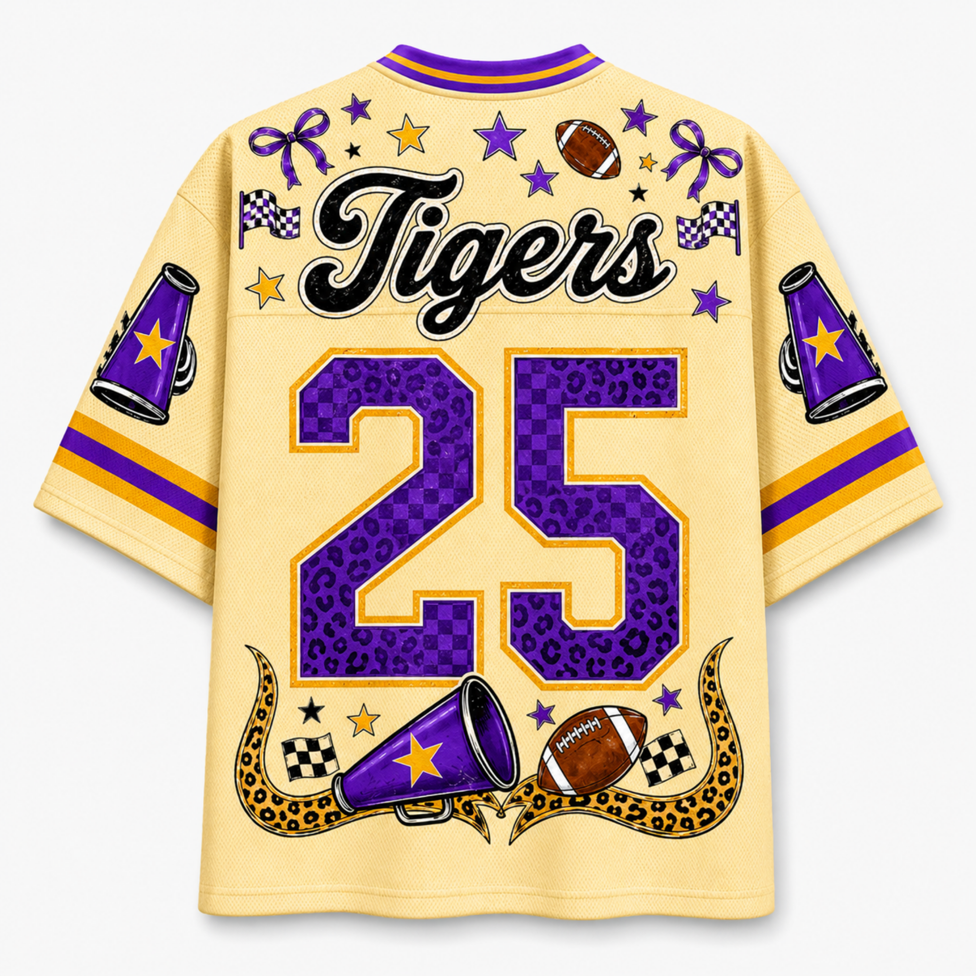 A short-sleeve t-shirt shown from the back, featuring a light yellow base with purple and gold graphics. The back is decorated with the word 'Tigers' in black script, the number '25' in purple leopard print with gold borders, and football-themed illustrations including a football, megaphones, stars, and checkered flags.