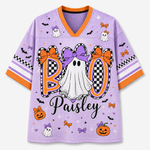 A purple mesh short-sleeve V-neck jersey with orange trim and a Halloween graphic that reads 'BOO Paisley' with ghosts, pumpkins, bats, and checkered details on a light gray background.
