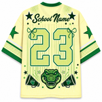 A pale yellow and green custom sports jersey shown from the back, featuring a large number 23, 'School Name' text, green stars, a green alligator head graphic, and green megaphones on a white background.
