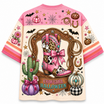 Back view of the Chaotic Club Halloween jersey displaying 'COWGIRL HALLOWEEN' text under a pink and leopard cowgirl boot framed by lasso ropes and horseshoe icons.