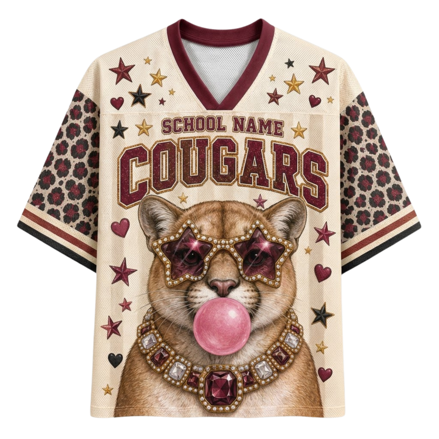 A custom-style beige athletic jersey with a V-neck, featuring a graphic of a cougar wearing pink rhinestone sunglasses and a jeweled collar, blowing a pink bubblegum bubble. The jersey has 'SCHOOL NAME COUGARS' printed across the chest, patterned sleeves, and scattered pink and gold stars.