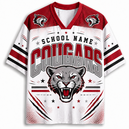 A short-sleeve V-neck athletic jersey with a white body, red shoulders, and bold 'COUGARS' lettering across the chest, plus a large cougar head graphic and smaller 'SCHOOL NAME' text. The jersey has red, white, and black striping on the sleeves and a cougar logo on the shoulders.