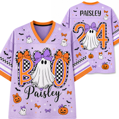 A light purple mesh V-neck jersey shown from the front and back, decorated with Halloween graphics including ghosts, pumpkins, bats, bows, checkered patterns, and the name 'Paisley' with the number 24.