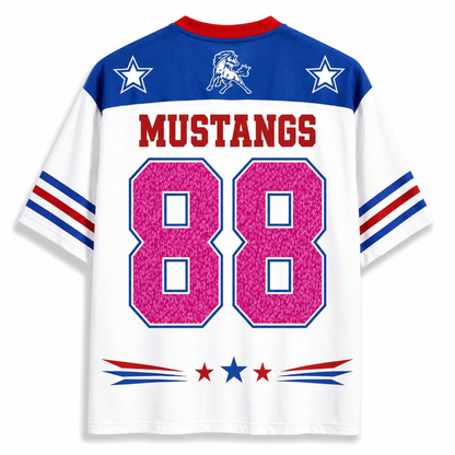 White short-sleeve sports jersey with blue shoulders, red collar trim, red 'MUSTANGS' text, blue and red sleeve stripes, a charging wildcat logo on the chest, and large pink '88' numbers outlined in blue on the back.