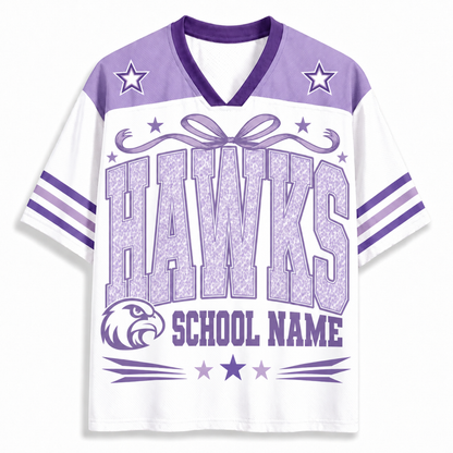 A white and purple short-sleeve V-neck jersey-style shirt with 'HAWKS' and 'SCHOOL NAME' printed on the front, plus a hawk head logo and star details, shown on a plain light background.