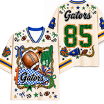 A custom football jersey shown from both the front and back. The jersey is cream-colored with blue and yellow stripes on the sleeves and collar.