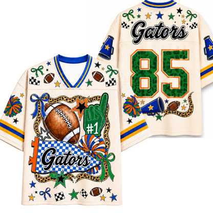 A custom football jersey shown from both the front and back. The jersey is cream-colored with blue and yellow stripes on the sleeves and collar.