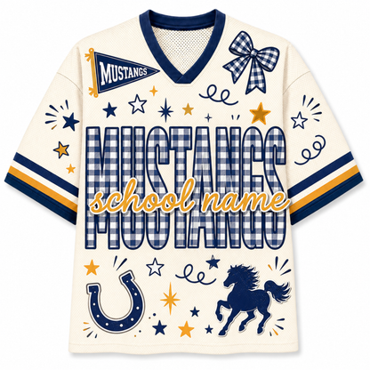 A cream-colored V-neck football jersey with navy blue and gold graphics. The jersey features the word 'MUSTANGS' in a blue-and-white gingham pattern, a blue-and-white gingham bow on the chest, a blue horseshoe, a blue horse silhouette, and a gold script overlay reading 'school name'.