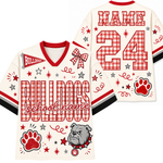 Personalized cream-colored football jersey shown from both front and back, featuring red and white gingham patterned lettering for 'BULLDOGS' and number '24', red paw print, bulldog mascot graphic, and customizable text fields.