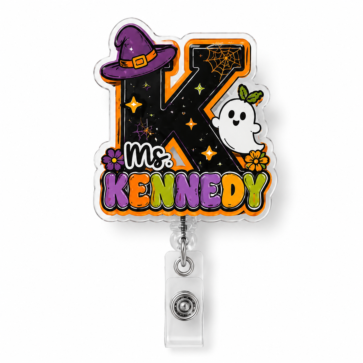 A Halloween-themed retractable badge reel featuring a large letter 'K' decorated with a purple witch hat, spiderweb, stars, and a white ghost. Below the 'K' is the text 'Ms.