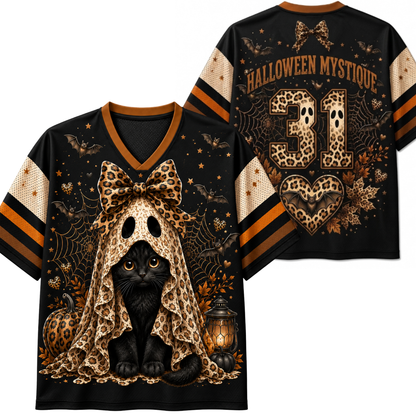 Black short-sleeve V-neck jersey-style shirt shown front and back, featuring a Halloween cat graphic: a black cat in a leopard-print hood with a large bow, spiderwebs, bats, stars, a lantern, and the text 'HALLOWEEN MYSTIQUE' on the back with the number 31.