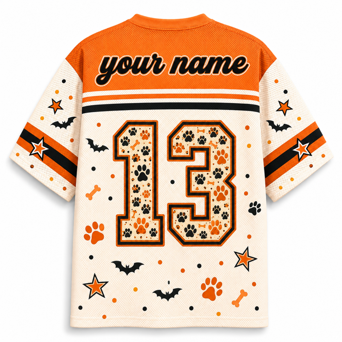 A short-sleeve custom dog jersey shown from the back, featuring an orange collar and shoulders, a cream body, and the number 13 filled with a paw-print pattern. The jersey includes 'your name' text across the upper back and Halloween-themed graphics like paw prints, bones, bats, stars, and dots on the sleeves and lower body.
