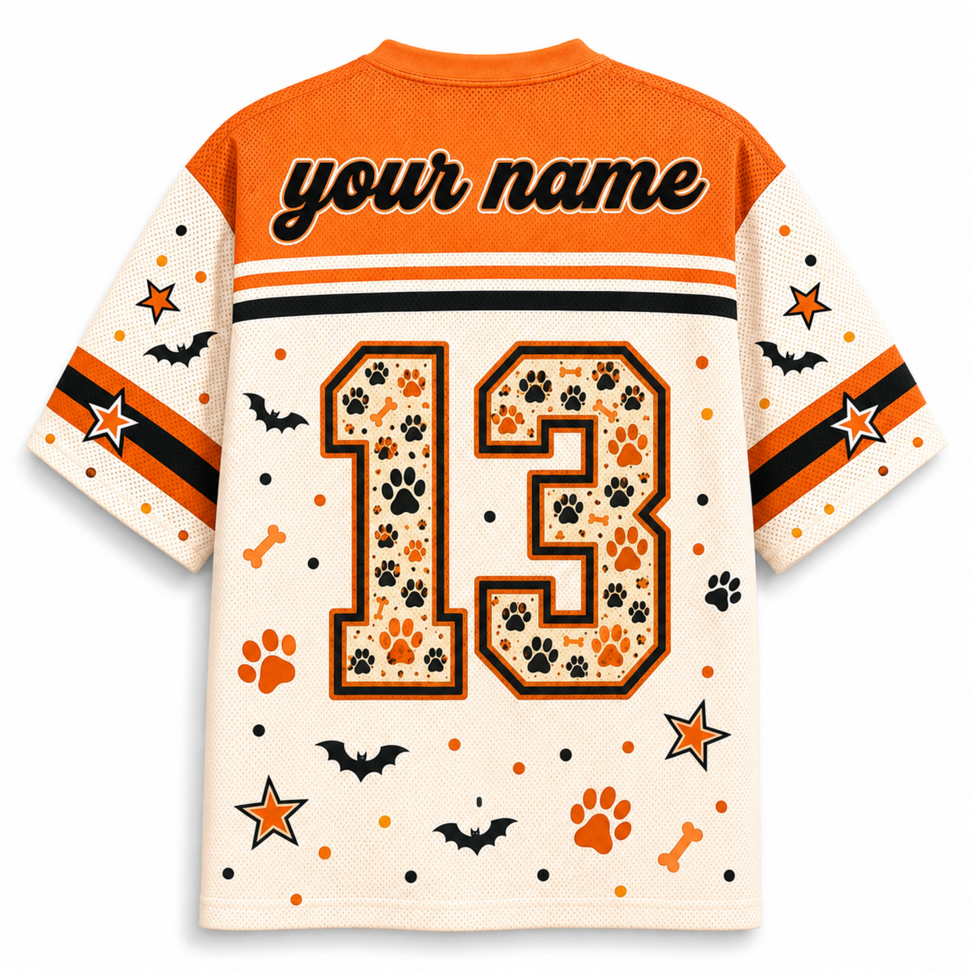 A short-sleeve custom dog jersey shown from the back, featuring an orange collar and shoulders, a cream body, and the number 13 filled with a paw-print pattern. The jersey includes 'your name' text across the upper back and Halloween-themed graphics like paw prints, bones, bats, stars, and dots on the sleeves and lower body.