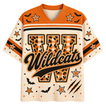 A short-sleeve V-neck athletic jersey with a Halloween theme. The jersey features orange shoulder panels, a cream body, and a large central letter 'W' filled with an orange-and-cream gingham pattern and leopard print details.