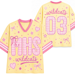 Front and back mockup preview of the pastel yellow and pink Chaotic Club jersey featuring MHS pink gingham letters, coquette bows, and Wildcats number 03.