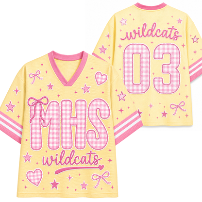 Front and back mockup preview of the pastel yellow and pink Chaotic Club jersey featuring MHS pink gingham letters, coquette bows, and Wildcats number 03.