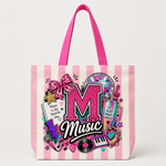 A pink and white striped tote bag featuring a colorful 'Music' graphic design with a glittery pink letter 'M', a disco ball, a bow, and musical instruments.