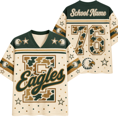 A custom football jersey shown from both front and back. The jersey features a cream base with dark green and tan camouflage patterns, decorated with eagle head graphics, stars, and the word 'Eagles' on the front.