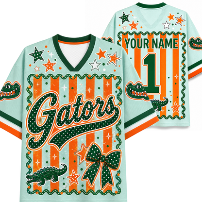 A custom Florida Gators themed jersey shown from the front and back. The light blue base features green and orange accents, including a large 'Gators' script, alligator graphics, stars, stripes, and a bow.