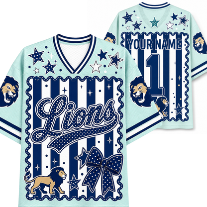 A light blue and navy blue custom sports jersey mockup showing the front and back views. The design features a navy blue and white vertical stripe pattern with scalloped borders, decorated with stars, a large bow, a lion graphic, and customizable text 'Lions' and 'YOURNAME 1'.