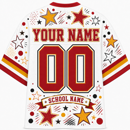 White short-sleeve athletic jersey shown from the back with red and gold custom print. The back features a red collar, large red number '00' outlined in black, customizable 'YOUR NAME' text, a red banner reading 'SCHOOL NAME', and scattered star and firework graphics in red, gold, black, and white.