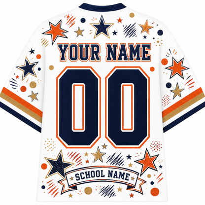 White short-sleeve customizable sports jersey shown from the back, featuring navy and orange star graphics, decorative confetti dots, and placeholder text reading 'YOUR NAME', '00', and 'SCHOOL NAME'.