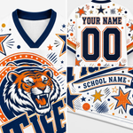 Custom sports jersey mockup showing front, back, and graphic details. The white jersey features navy blue trim, orange and navy star/dot patterns, a roaring tiger mascot graphic, and customizable text fields reading 'YOUR NAME', '00', and 'SCHOOL NAME'.