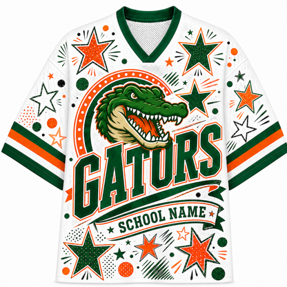 A white V-neck athletic jersey with green and orange collegiate graphics, featuring a large alligator head, the word 'GATORS' in bold green letters, decorative stars, dots, and stripes, and a banner reading 'SCHOOL NAME'.