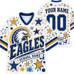 Customizable white V-neck athletic jersey shown from the front and back, featuring a large eagle head graphic, the word 'EAGLES' in bold blue letters, stars, stripes, and placeholder text 'YOUR NAME' and 'SCHOOL NAME'.