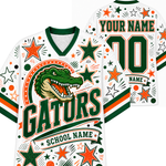 Custom Florida Gators themed white football jersey mockup showing front and back views. The jersey features a green alligator graphic, green and orange lettering, star patterns, and customizable text fields for 'YOUR NAME' and 'SCHOOL NAME'.
