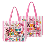 Two pink and white striped tote bags with colorful graphics celebrating science and art teachers, shown on a plain white background.