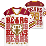 A white V-neck graphic T-shirt shown from the front and back, featuring maroon shoulder panels, gold trim, red and gold 'BEARS' lettering, star motifs, and a large bear head graphic on the front.
