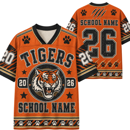 Customizable orange tiger jersey with black and white details, featuring a roaring tiger graphic, paw prints, and placeholders for 'TIGERS', 'SCHOOL NAME', and number '26'.