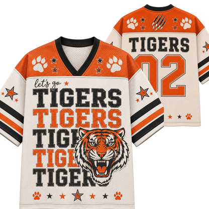 A football-style jersey shown from the front and back on a plain white background. The front has orange shoulder panels, a cream body, black and orange lettering reading 'let's go TIGERS TIGERS TIGERS TIGER,' paw prints, stars, and a tiger head graphic.