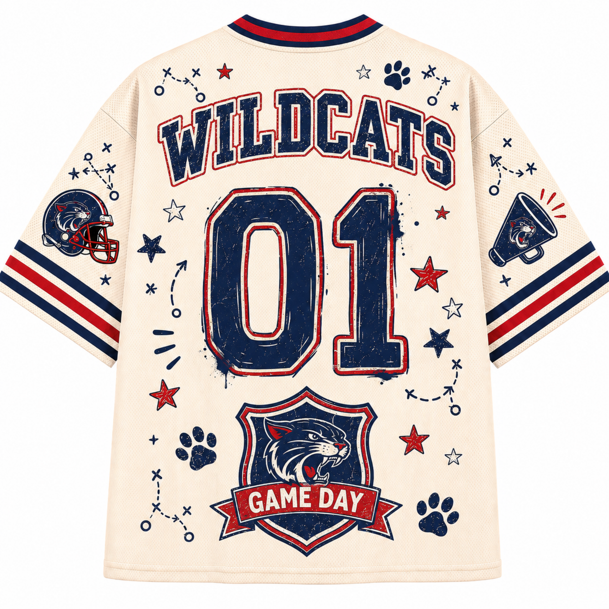 Back view of a cream-colored short-sleeve jersey with 'WILDCATS' and '01' printed in navy blue with red outlines, decorated with stars, paw prints, a football helmet patch, and a 'GAME DAY' shield on the lower back.