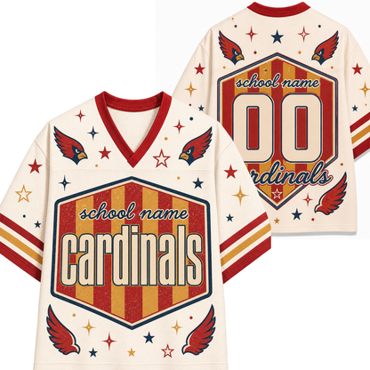 Front and back views of a customizable football jersey. The jersey has a cream base with red and gold accents, featuring a large shield graphic with 'school name Cardinals' on the front, and matching graphics on the back.