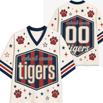 Front and back views of a custom mesh sports jersey in cream, navy, and red. The jersey features a V-neck, short sleeves with striped cuffs, and a central hexagonal graphic with the text 'school name' and 'tigers'.